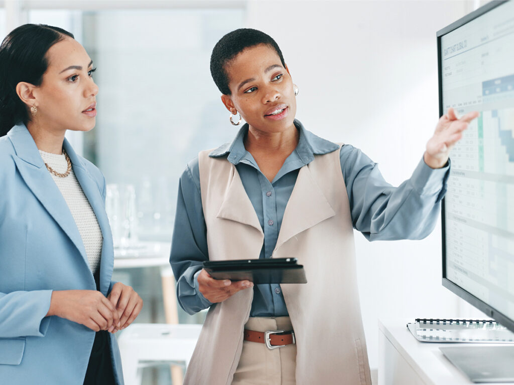 They discuss rcm in healthcare in an office setting indoors
